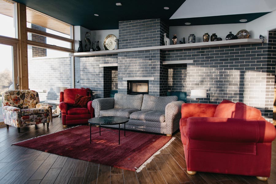 Staffs blue bricks provide a feature wall at this contemporary house in Derbyshire